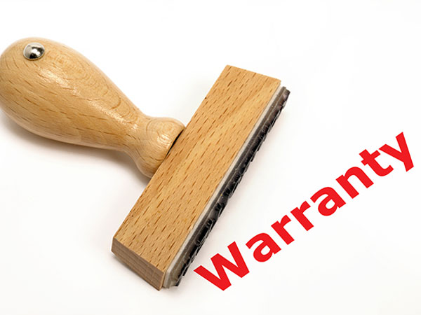Rubber stamp marked with WARRANTY